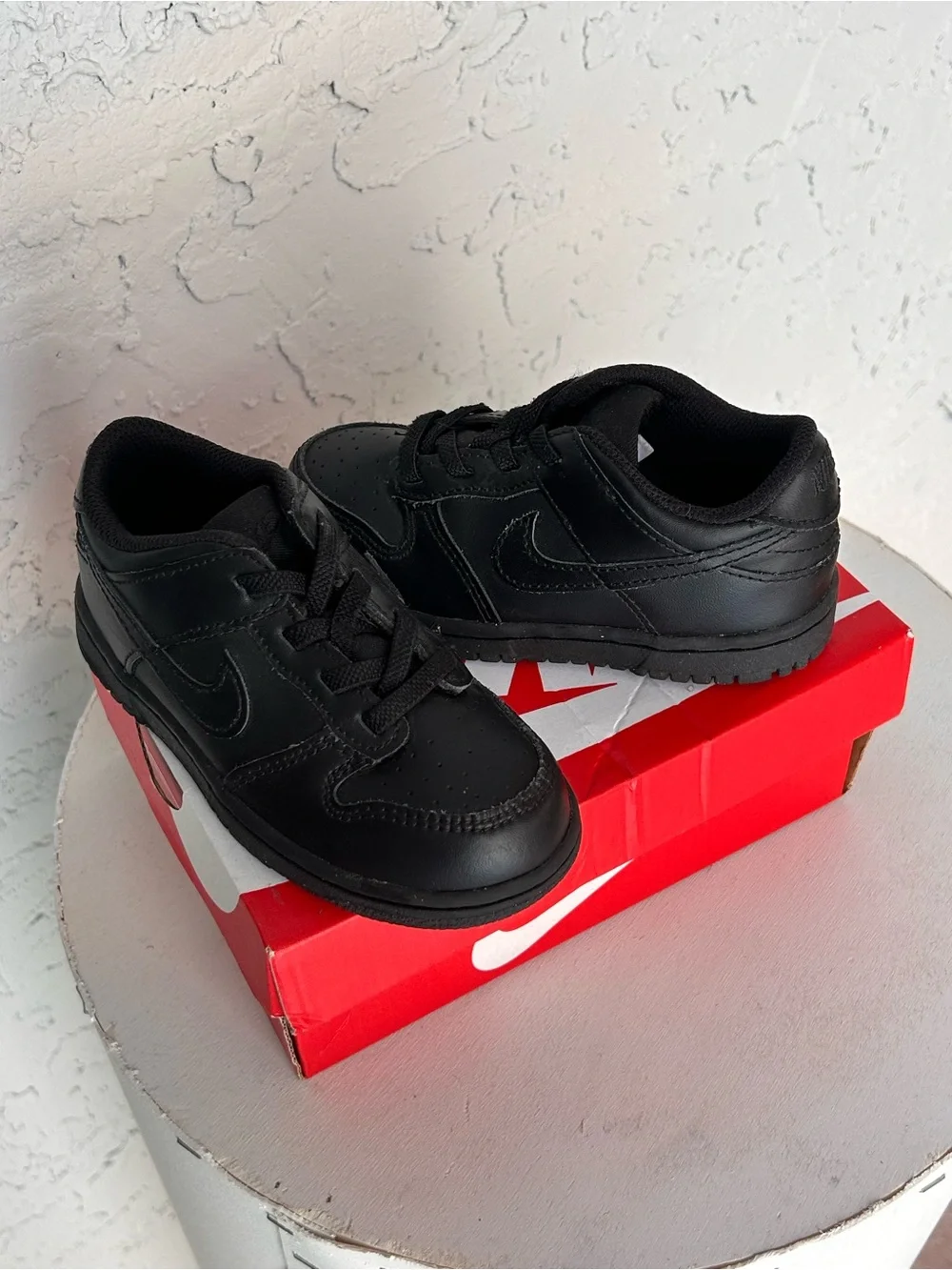 Nike Kids Black Leather Sneakers with Lace-Up Closure